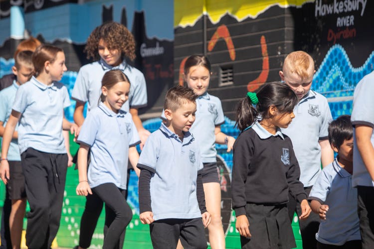group of student walking and talking at school